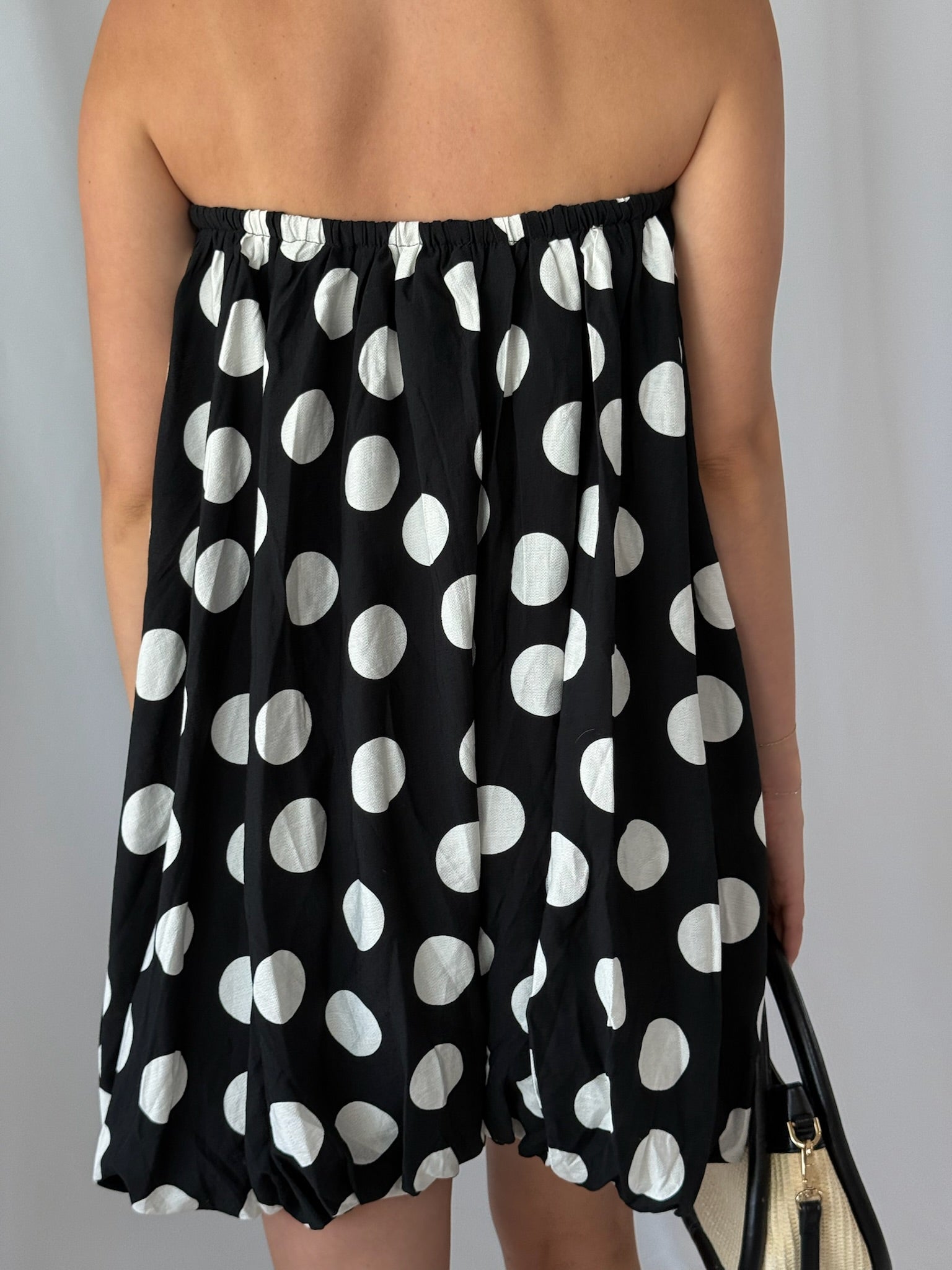 Eve Polka Dot Bubble Hem Romper- Black/White