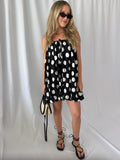 Eve Polka Dot Bubble Hem Romper- Black/White