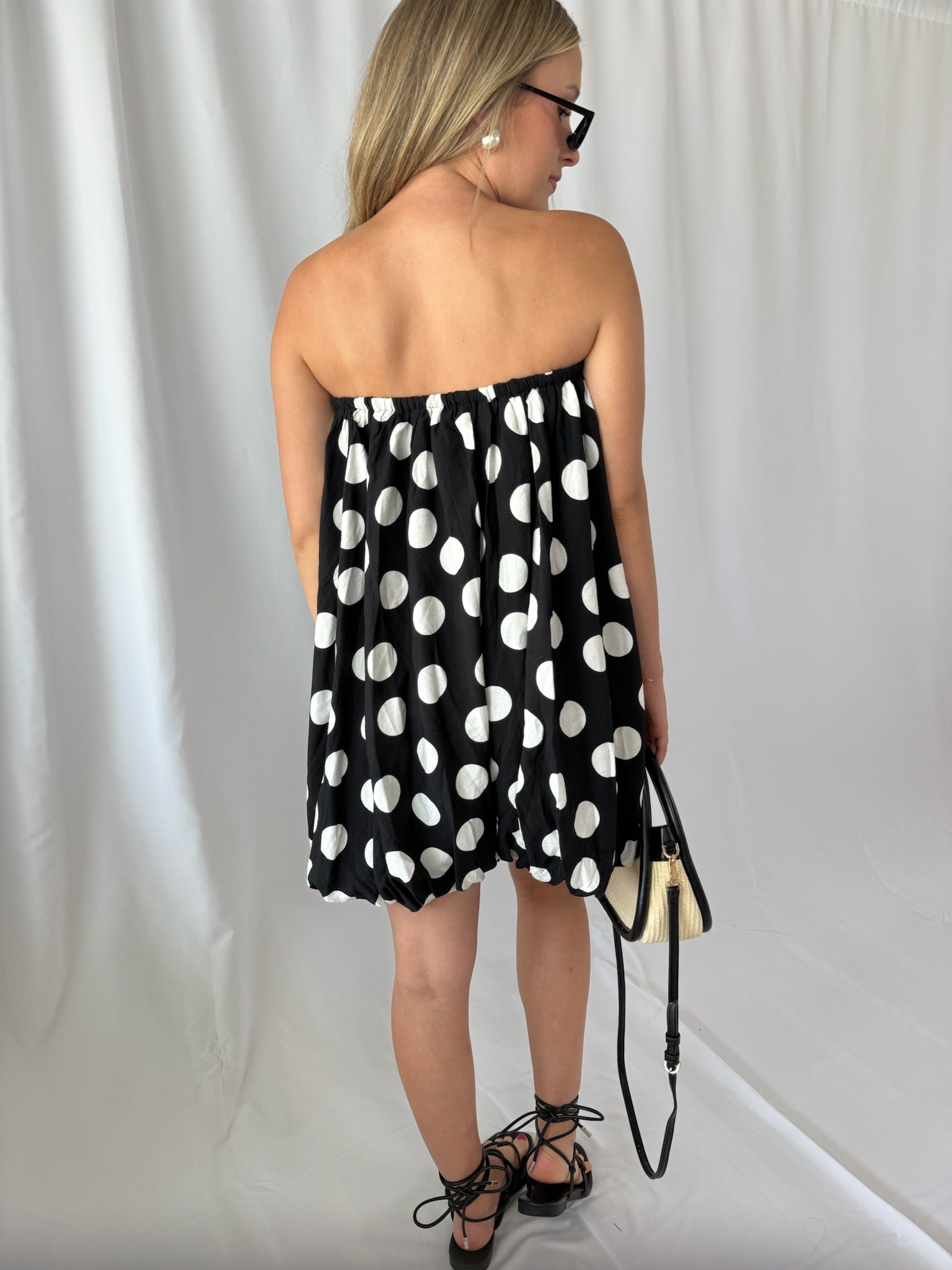 Eve Polka Dot Bubble Hem Romper- Black/White